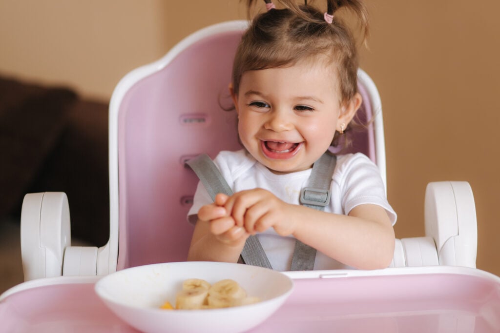 A baby eating nutritious vegan food