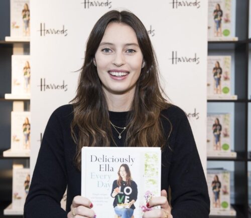 Deliciously Ella with one of her plant-based books