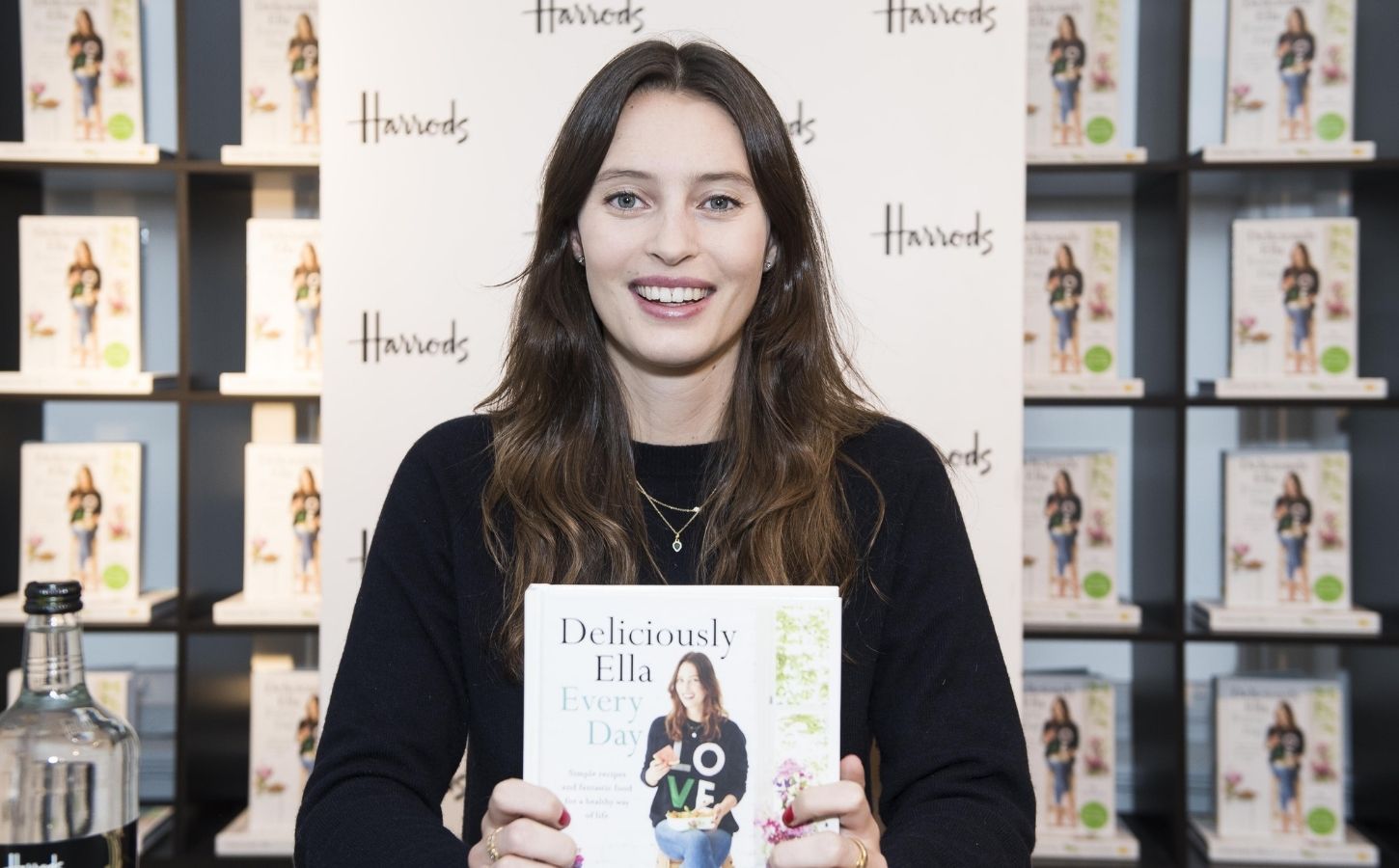 Deliciously Ella with one of her plant-based books