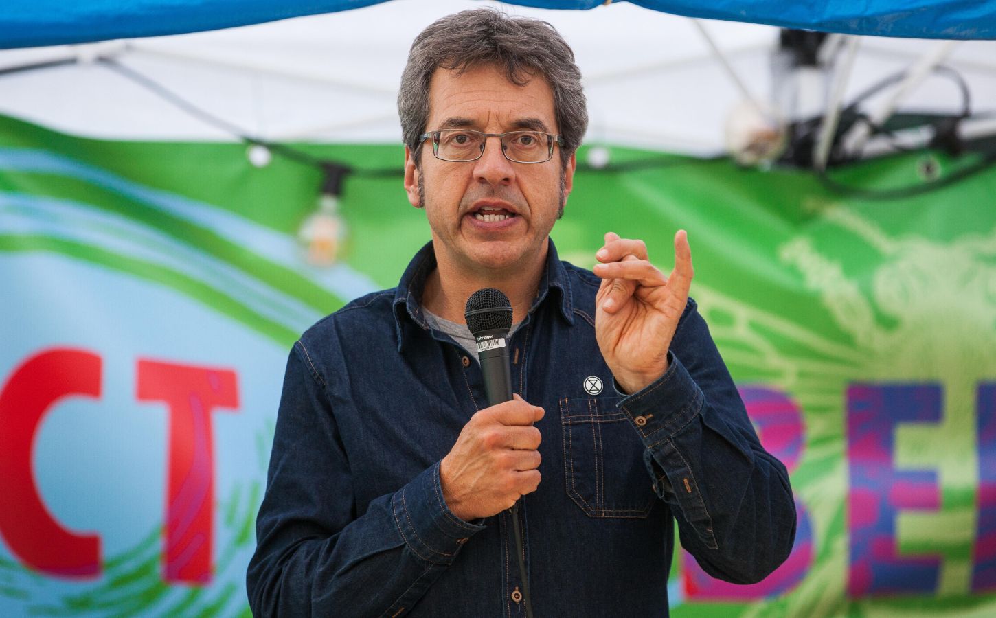 Environmental campaigner George Monbiot speaking at a festival