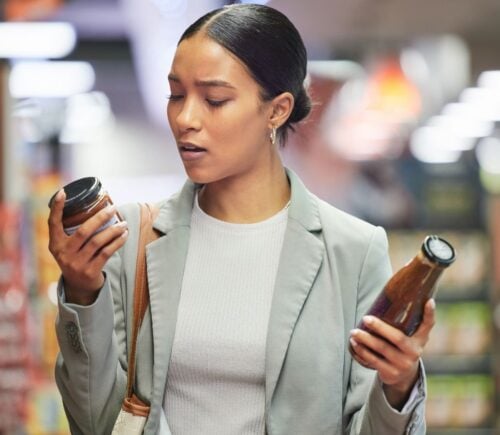 Woman reading food labels