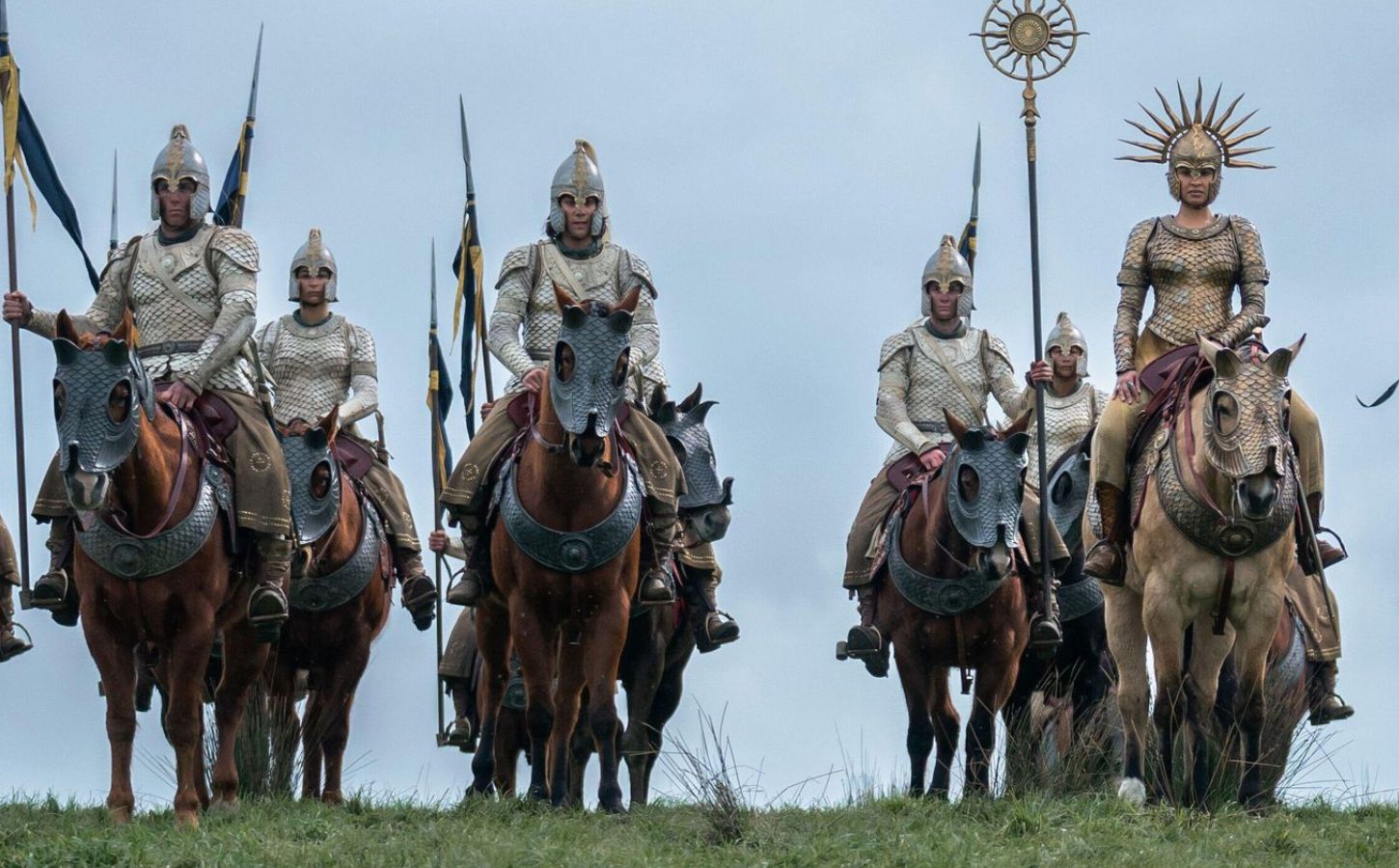 A still of The Rings Of Power, featuring horses heading off to battle