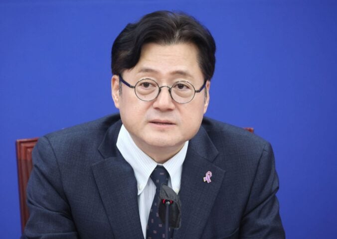 South Korea main opposition party's whip Hong Ihk-pyo, floor leader of the main opposition Democratic Party