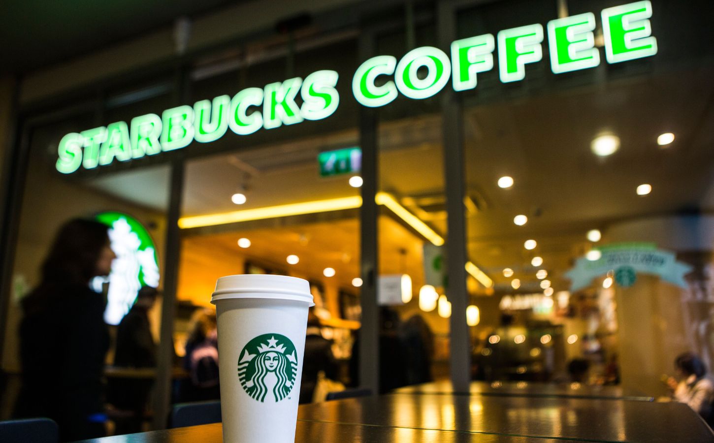 The outside window of a Starbucks, which has just dropped the surcharge for vegan milk in Germany