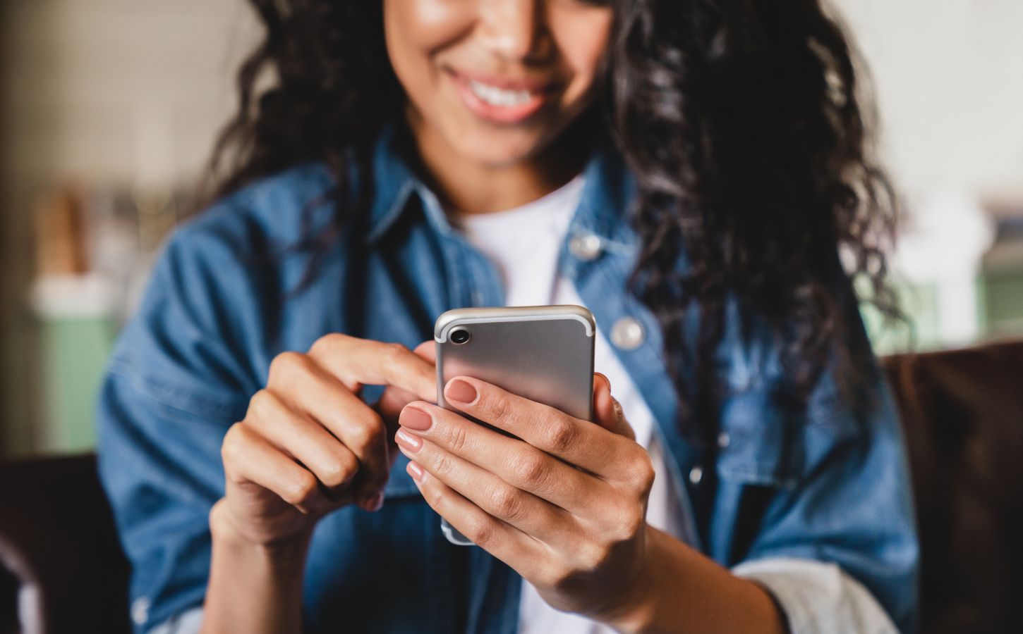 A woman on a vegan app on her phone