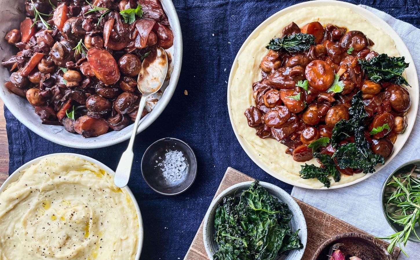 A vegan mushroom Bourguignon with white bean mash and kale chips