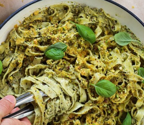 A vegan pasta dish, a plant-based fettuccine with pistachios