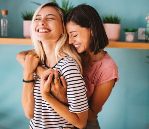 Two women hugging