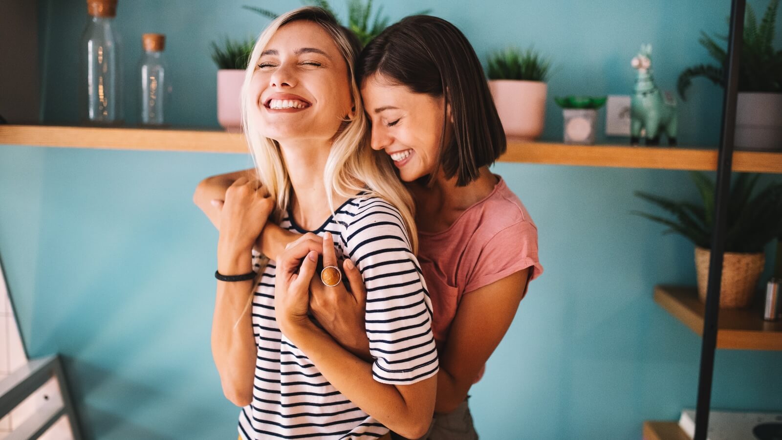 Two women hugging