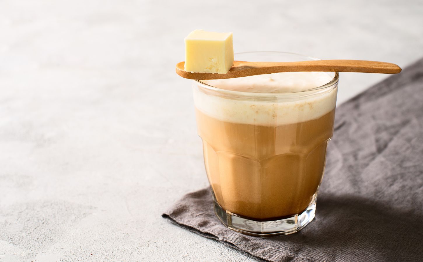 A cup of bulletproof coffee, a type of keto coffee containing butter